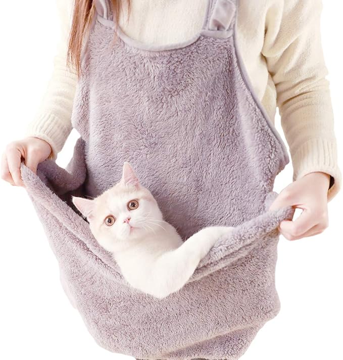 cat holding bag