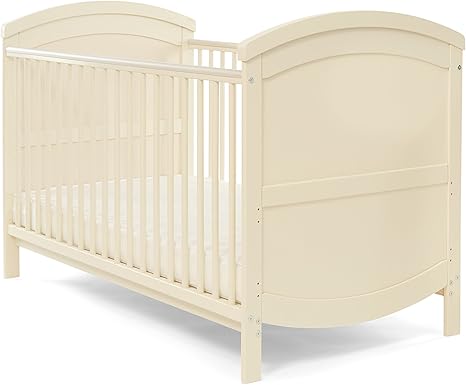 cream baby cot