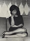 Eartha Kitt on a sofa Photo Print