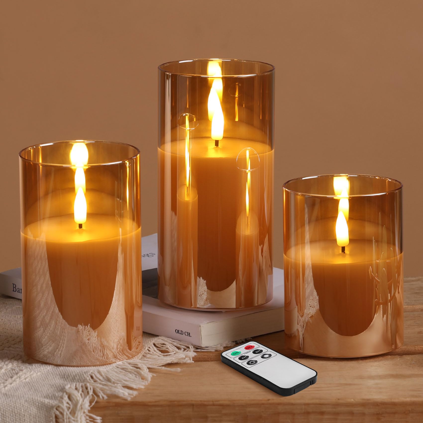 Photo 1 of Eywamage Gold Glass Flameless Pillar Candles with Remote, Flickering Fall LED Candles Battery Operated Set of 3