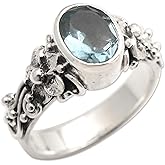 NOVICA Artisan Handmade Blue Topaz Single Stone Ring Oval Cut Silver with Floral Design Sterling Cocktail Indonesia Serenity Birthstone 'Frangipani Path'