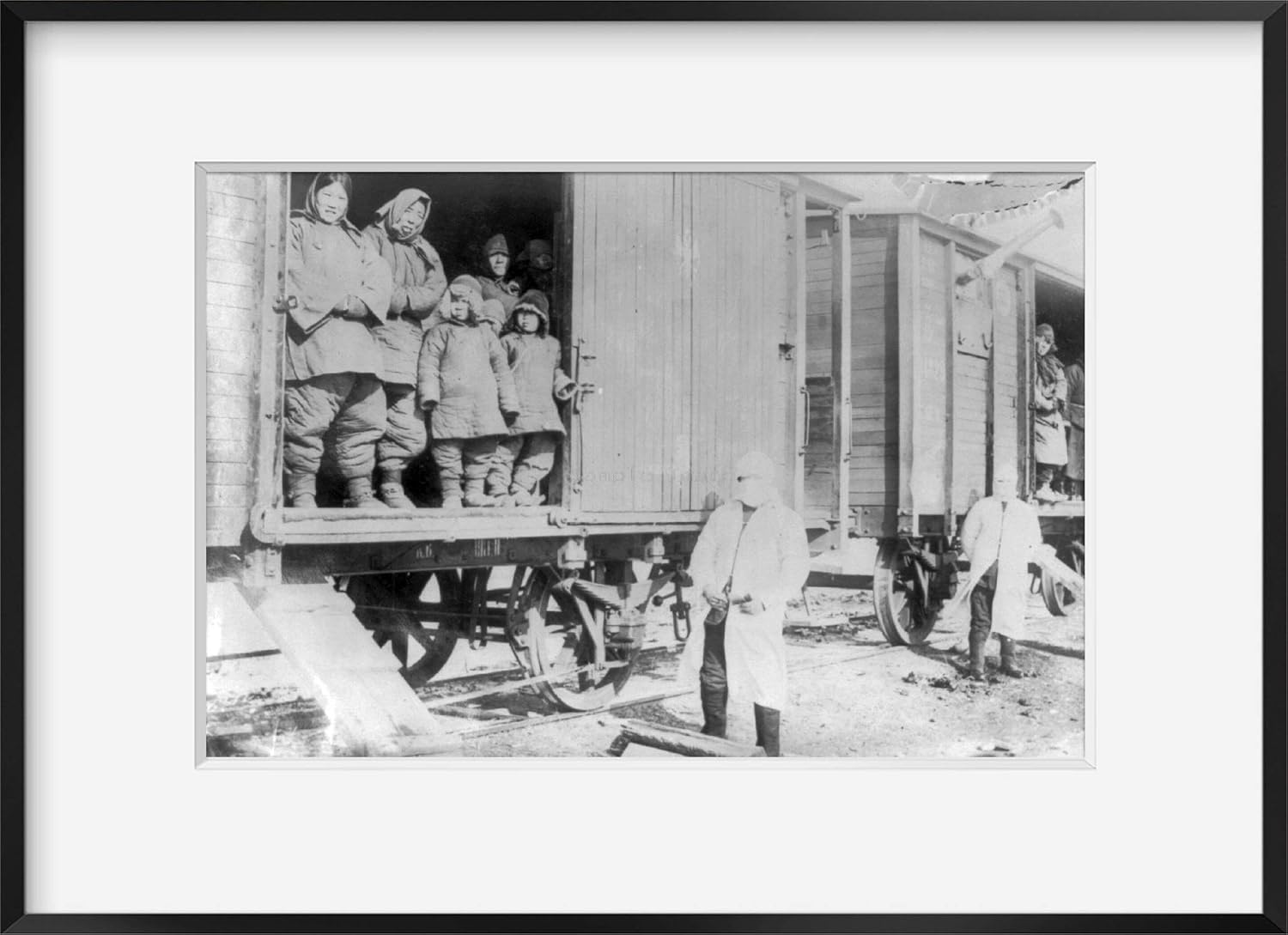 Photographs - INFINITE PHOTOGRAPHS Photo: Plague refugees in doorway of boxcar,train,Tieling,Manchuria & Korea,China,1911