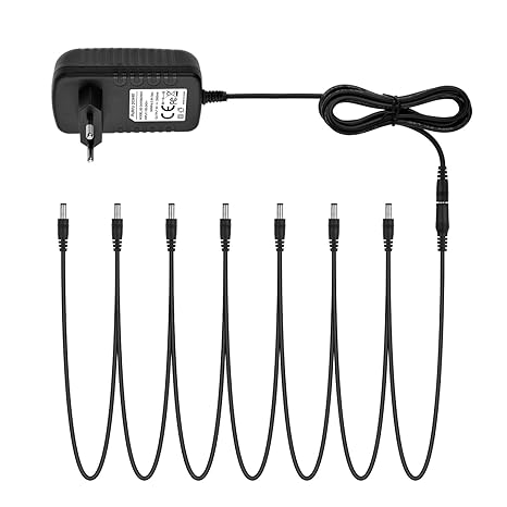 Aukru 9V DC 2A Netzteil Adapter mit 7 Daisychain Kabel für Gitarren Effektpedale Donner
