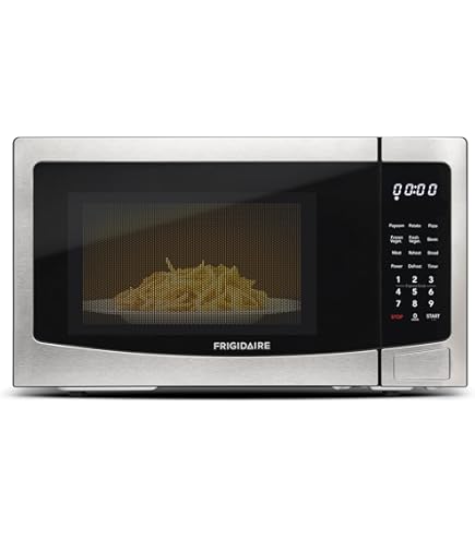 Frigidaire 0.7 Cu. Ft. Countertop Microwave - 700W, Digital, 6 Auto Cook Menus, Child Lock, White