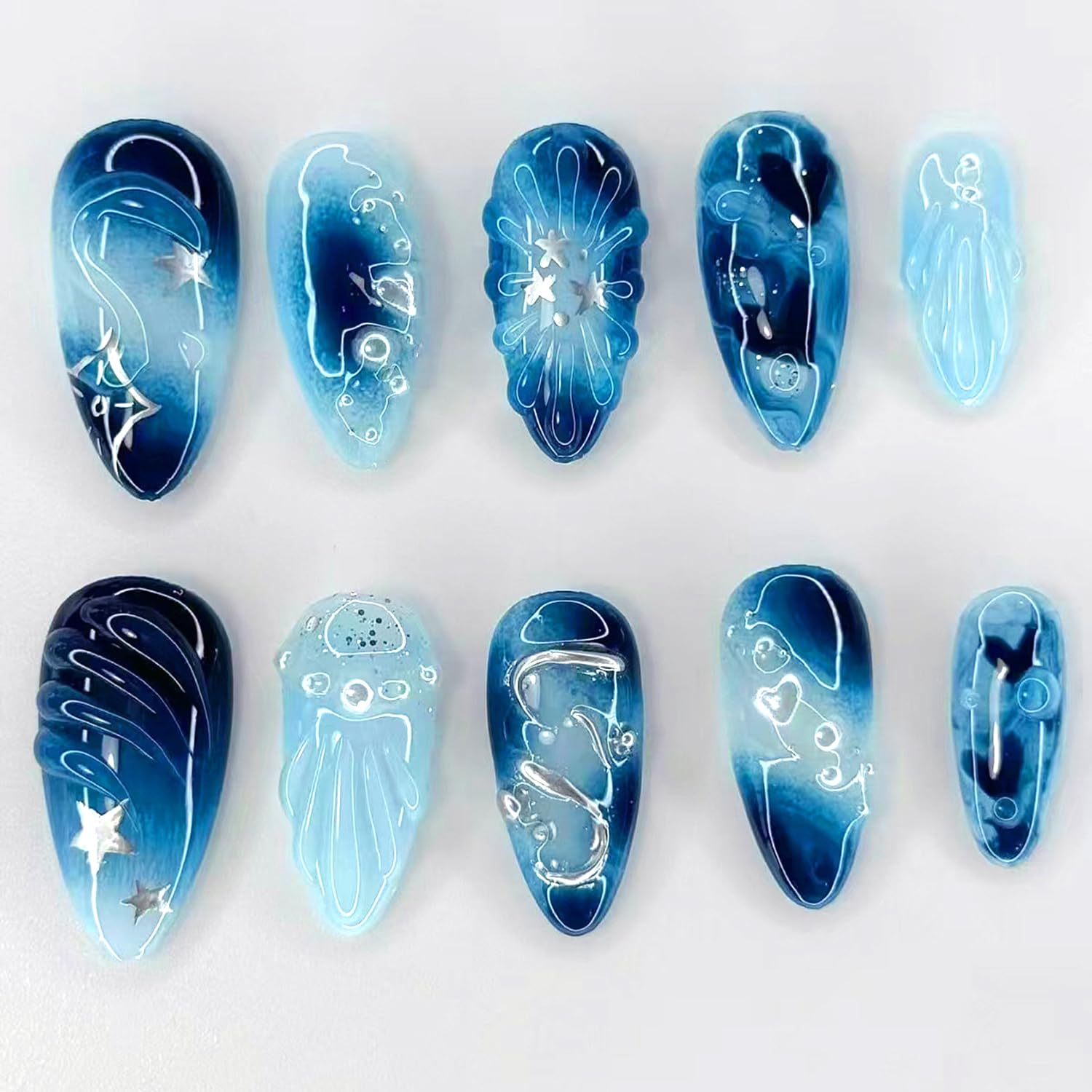 View 1 of 24Pcs Blue Press on Nails Medium Almond Glossy Fake Nails with 3D Wave Heart Pearl Star Sparkle Pattern Cute False Nail French Nails Full Cover Artificial Glue on Nail Handmade Stick on Nail for Women