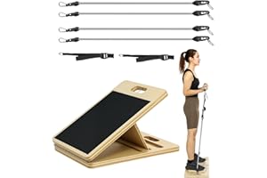 A grey Pilates bar with bands and slant board