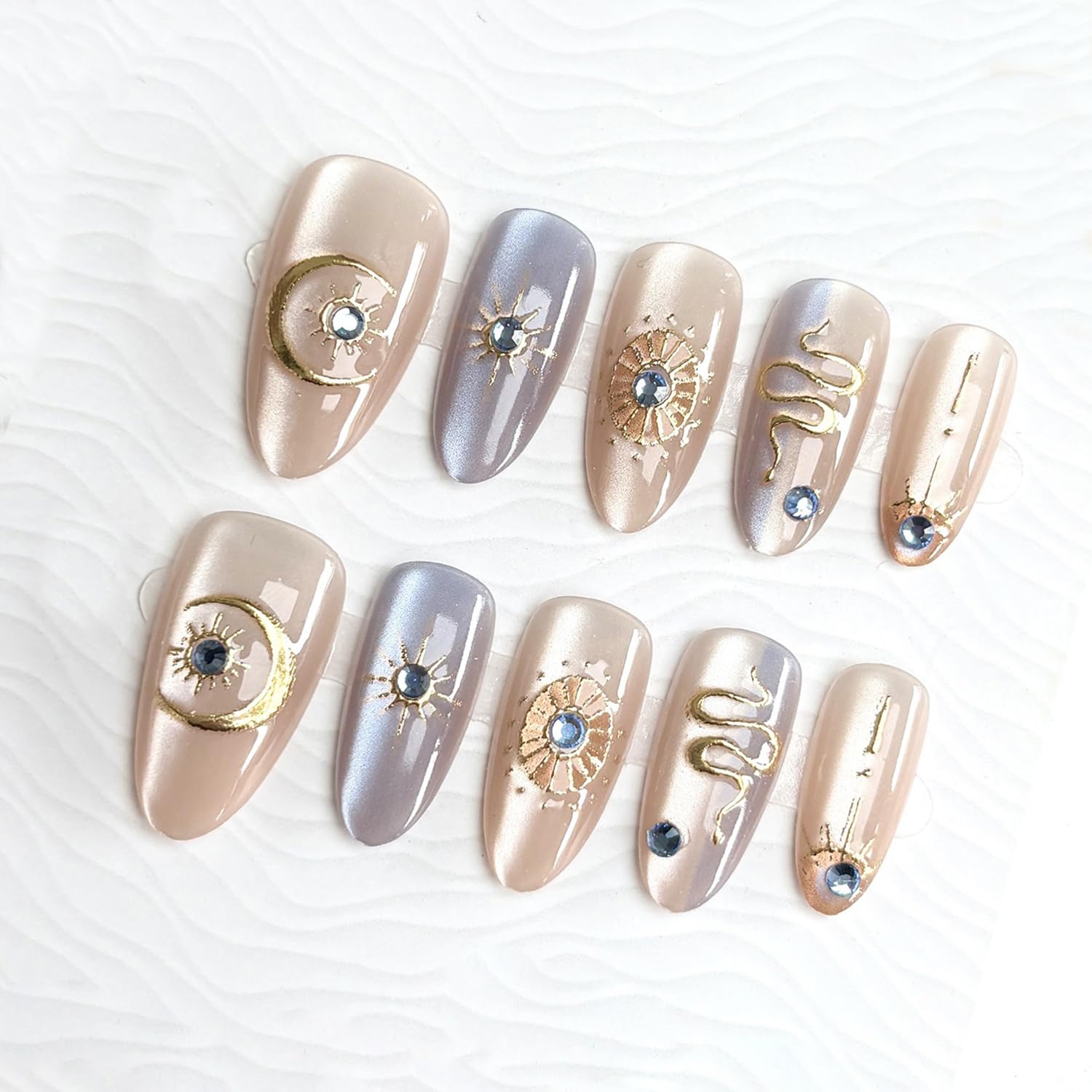 Photo 1 of 30Pcs Gold Star Press on Nails Medium Almond Fake Nails with 3D Blue Rhinestones Designs Glue on Nails Cute Moon Acrylic Nails Gold Snake French False Nails Bohemian Style Stick on Nails for Women