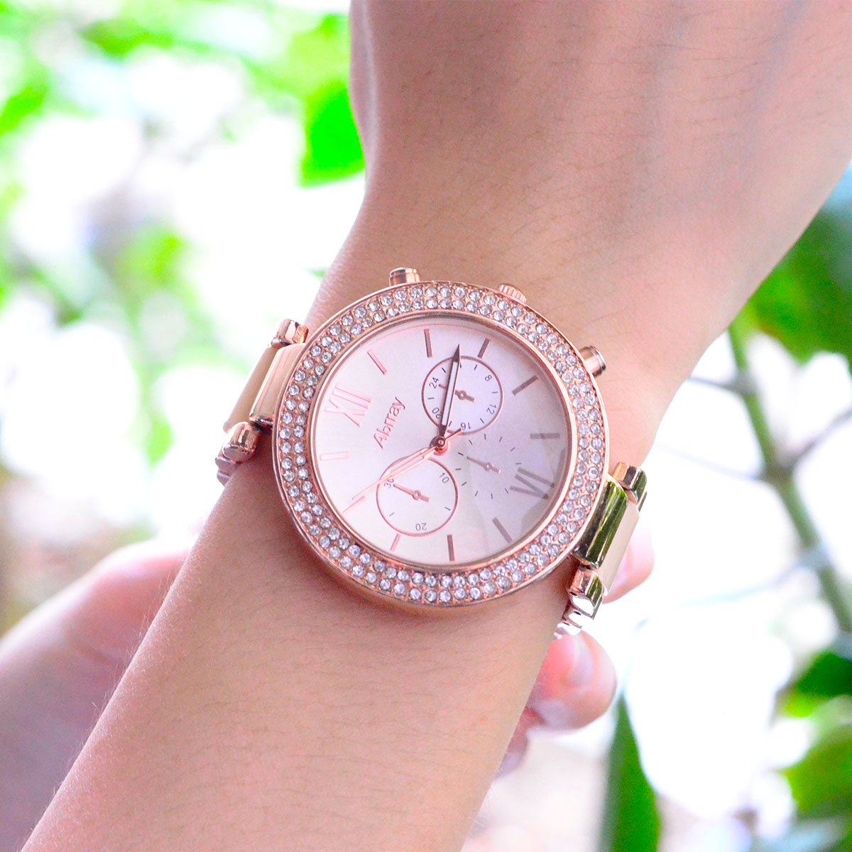 Oumosi Women\'s Swarovski Crystal Accented Gold-Tone and Pink Bracelet Wrist Watch