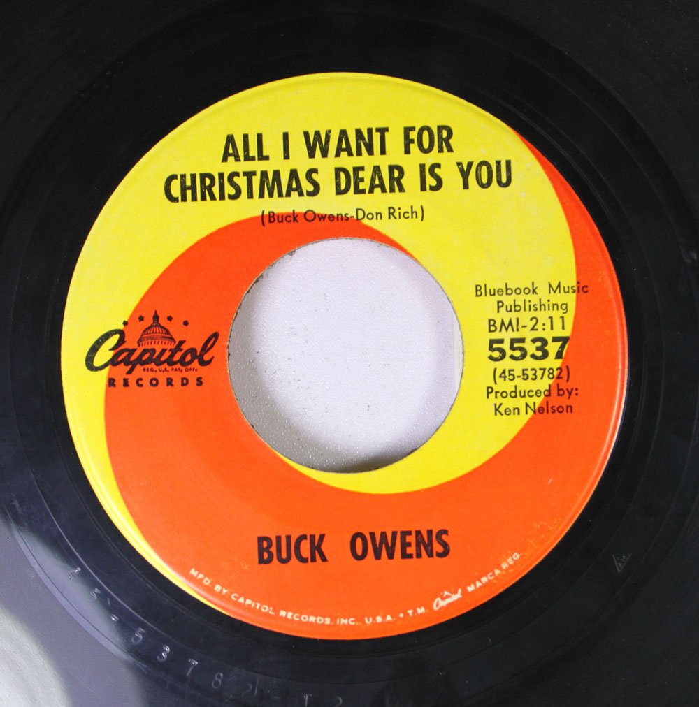 - Buck Owens 45 RPM All I Want For Christmas Dear Is You / Santa Looked A Lot Like Daddy