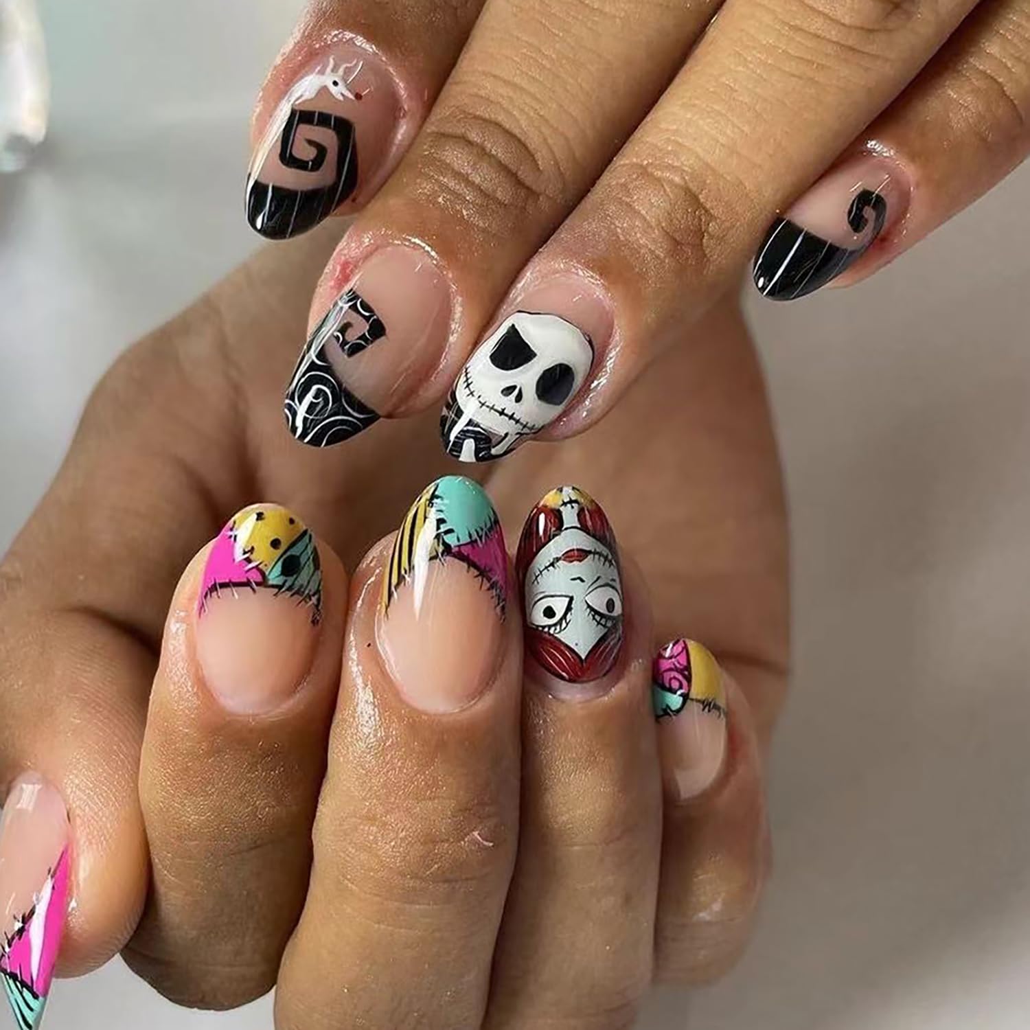 24 Pcs Halloween Press on Nails Short Almond Fake Nails Nightmare Before Christmas Acrylic Nails with Black White Skull Designs Glossy False Nails Stick on Nails for Women Girls