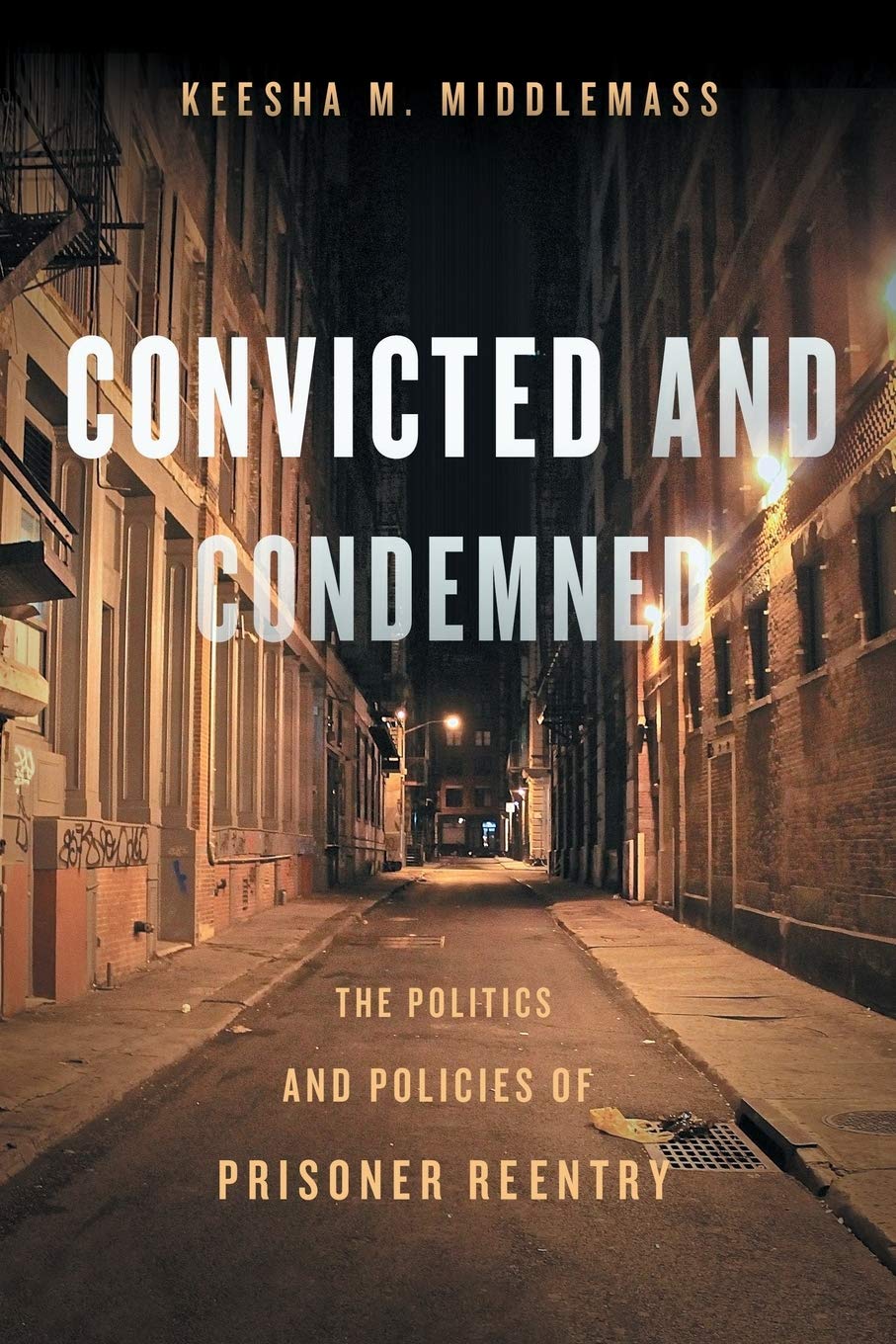 The cover of Convicted and Condemned. There is a photograph of a dark city alley behind the title.
