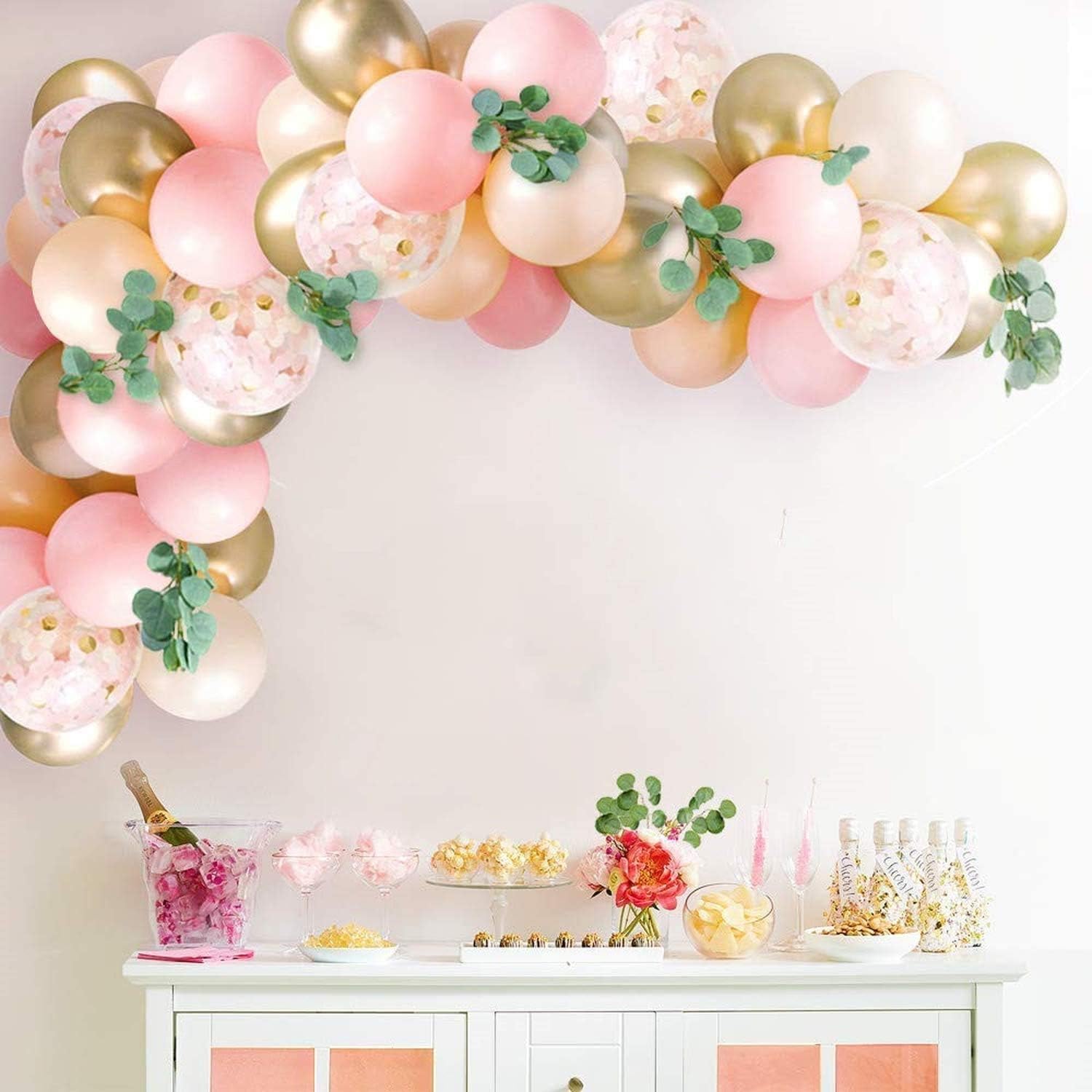 Pink and gold balloon garland arched suite, light pink balloons, pink balloons, golden metal balloons, golden confetti balloons and balloons, Pink balloons at the princess party