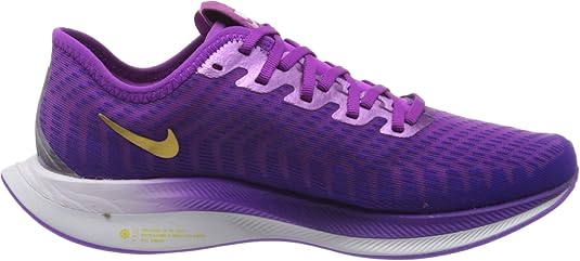purple and gold nike tennis shoes