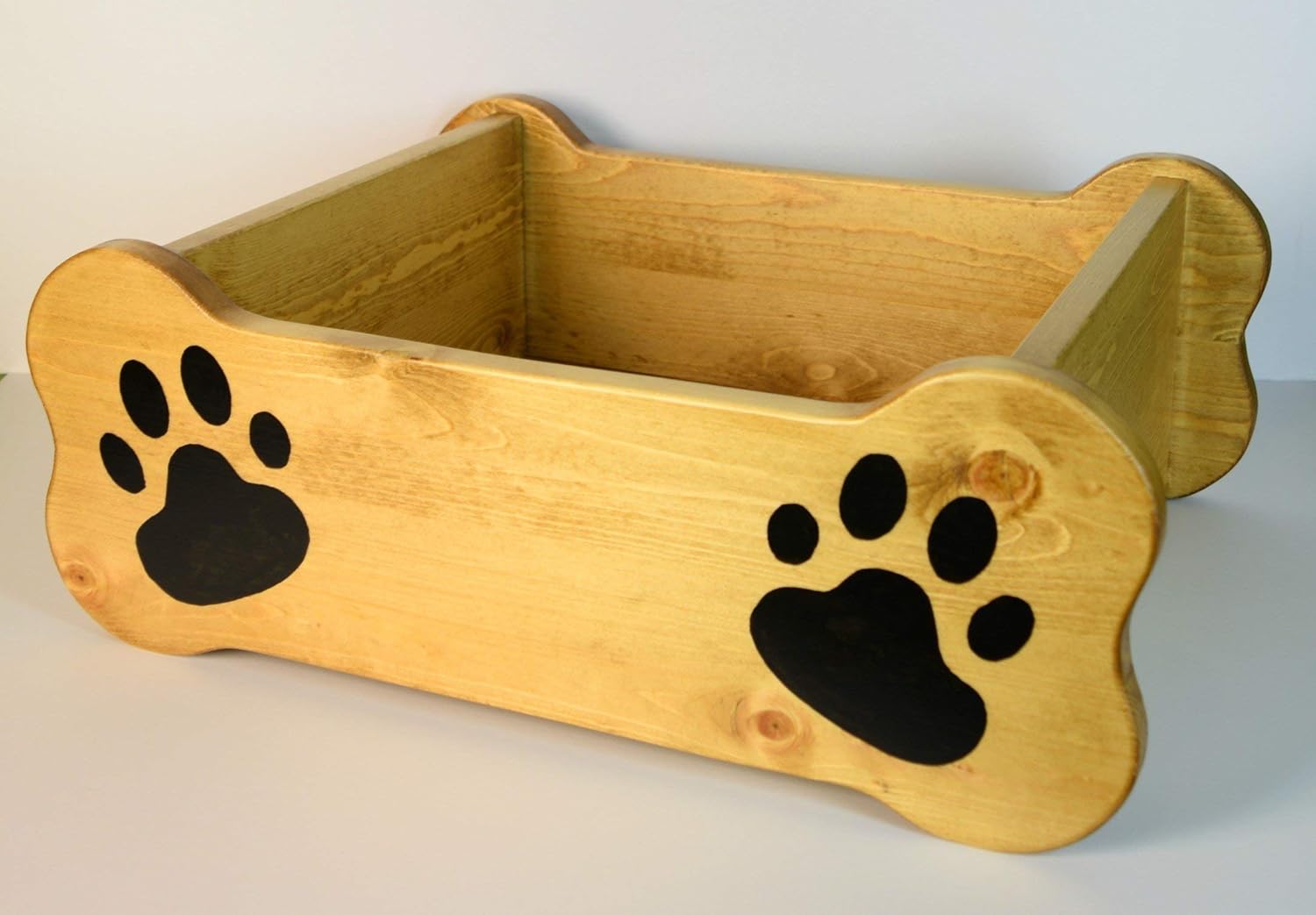Dog toy box, pet storage bin, small dog bed, paw print paint, wood container, chew