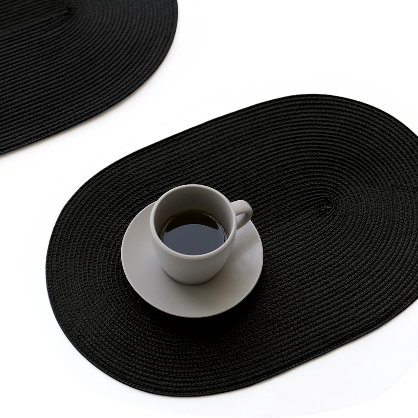 Photo 1 of FunWheat Oval Braided Placemats Set of 8 Table Mats for Dining Tables Washable Heat Resistant Place Mats for Indoor Outdoor Use 12 x18 Inch(Oval Black, 8pcs)