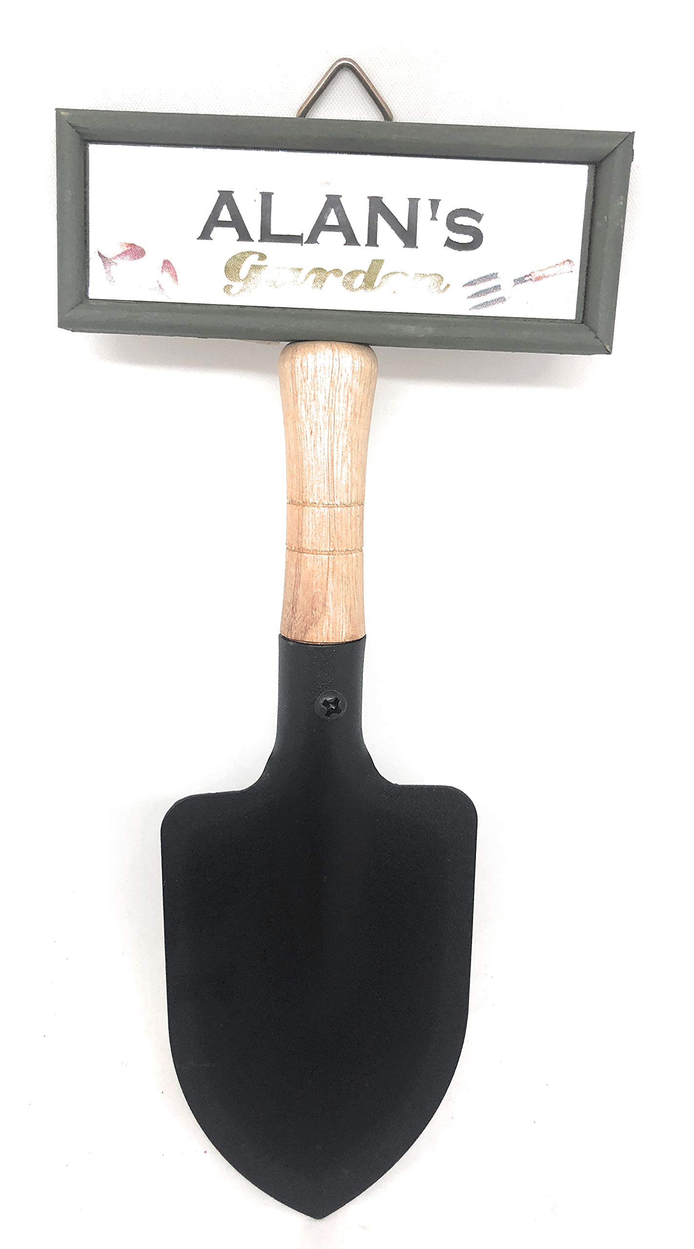 "Welcome to Alan's garden" hanging shovel sign