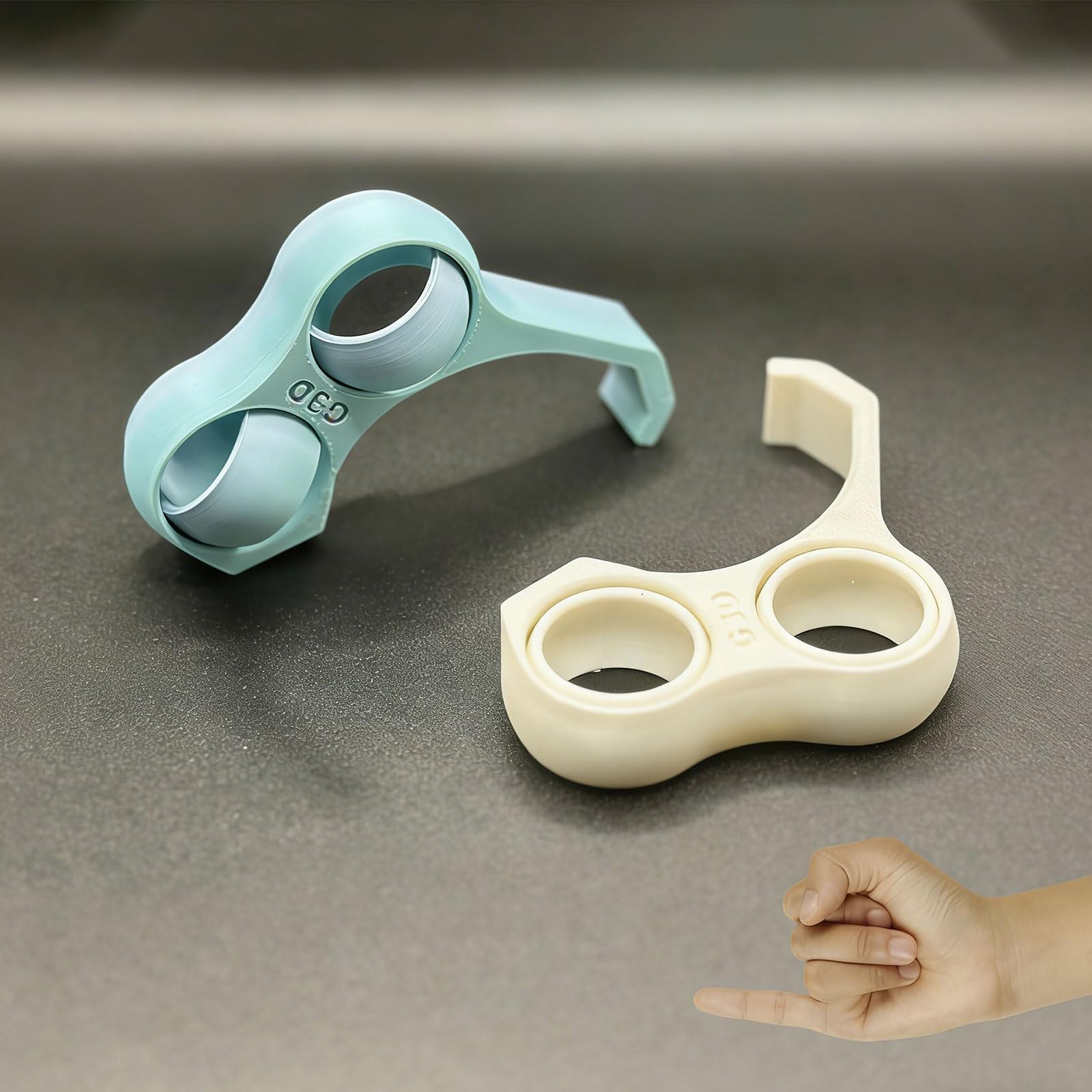 Photo 1 of 2 Pcs Finger Holder for Phone, Ergonomic Design Stand for Mobile Phone, 2 Holes Little Pinky and Ring Finger Grip Strap Holder for Hand, Portable Pinky Saver for Cellphone(White, Green)