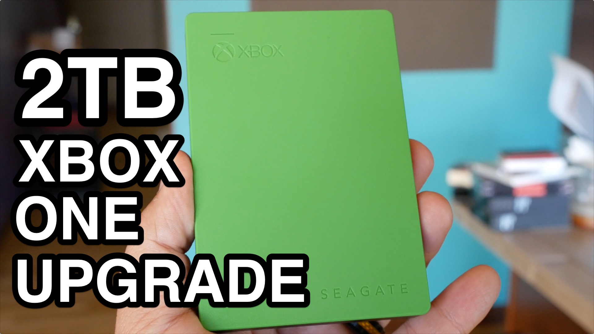 Green Seagate Game Drive for Xbox, a compact external hard drive.