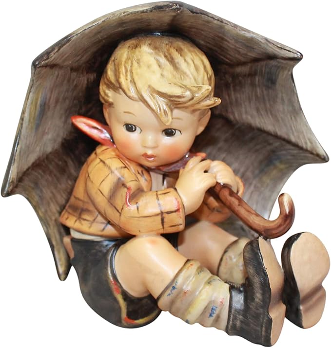 hummel boy with umbrella and suitcase