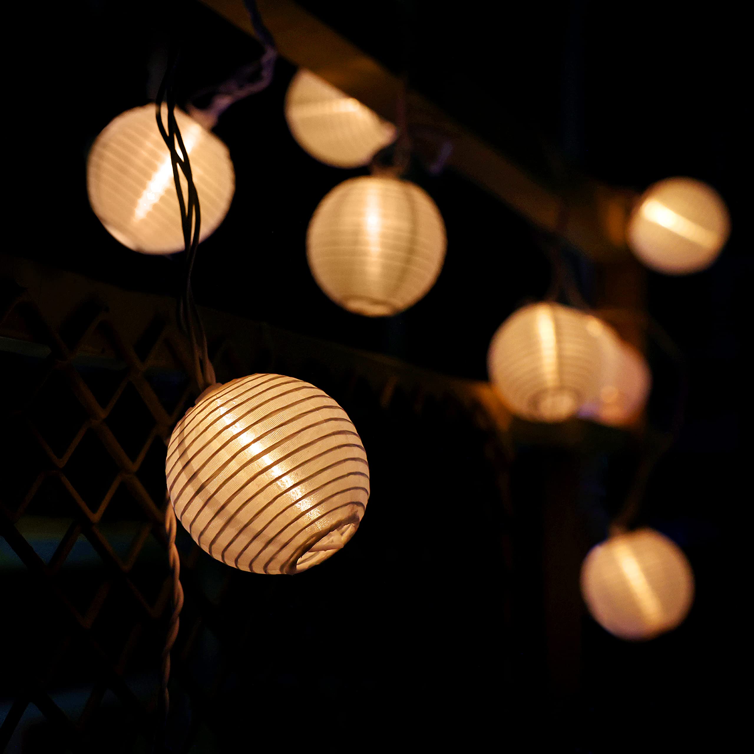 Photo 1 of VCOKEN Outdoor String Lights - 9.84 FT Warm White, IP44 Waterproof, Plug-in Mini Lanterns for Patio, Bistro, Party