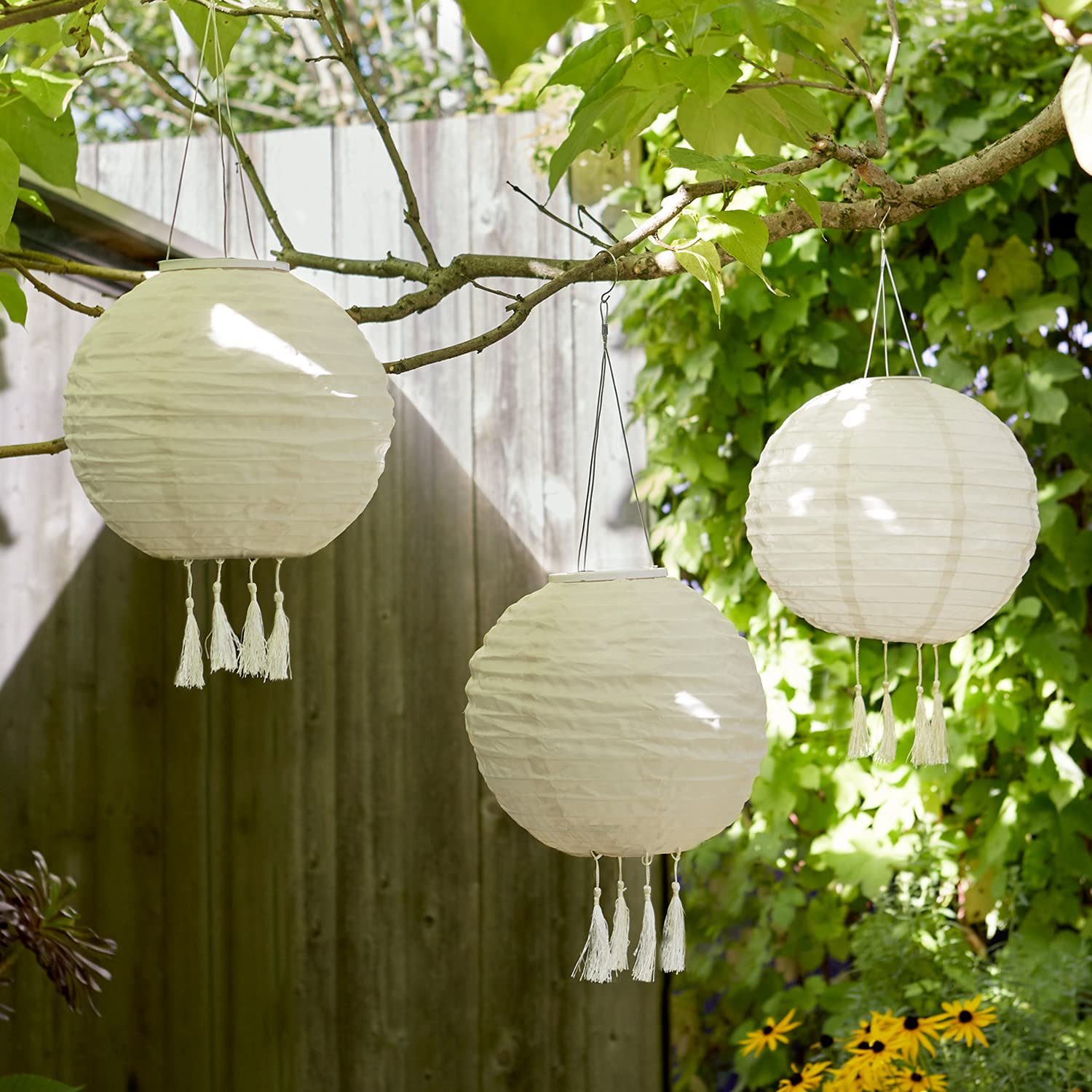 Lights4fun Set of 3 Outdoor LED Solar Powered Cream Chinese Hanging Garden Lanterns with Tassels IP44 Waterproof
