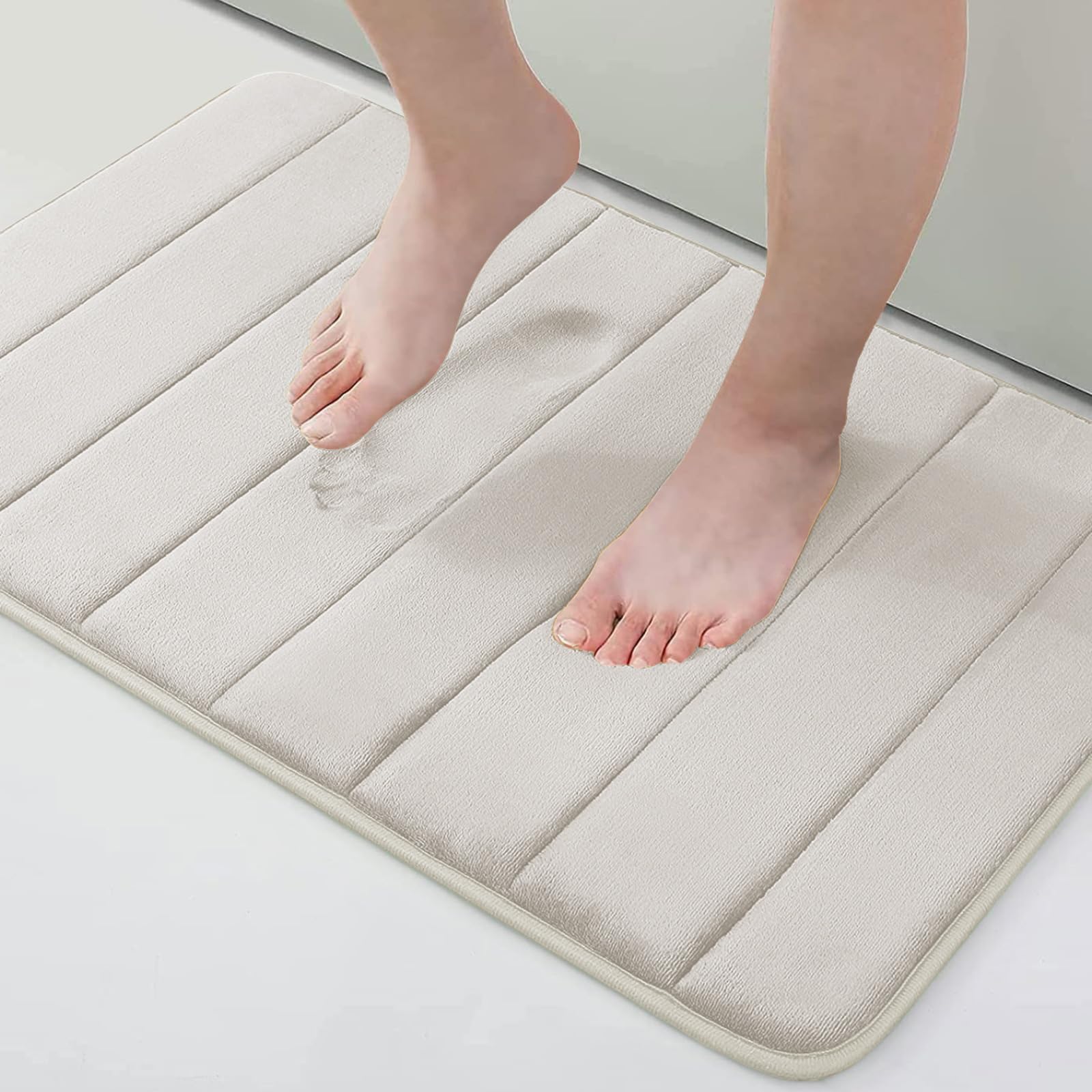 Photo 1 of Buganda Memory Foam Bath Mat, 30" x 20", Ultra Soft and Non-Slip Bathroom Rugs, Water Absorbent and Machine Washable Bath Rug for Bathroom, Shower, and Tub, Cream