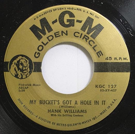 hank williams 45 RPM my buckets got a hole in it / We Live In Two