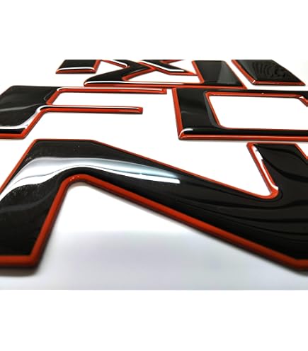 thumbnail interactive-video image 1 of AFX-TRIMS Tailgate Letters For Nissan Frontier 2025–2026 – Black/Orange 3D Raised Domed, Gloss Finish, Easy Install 1 of 5