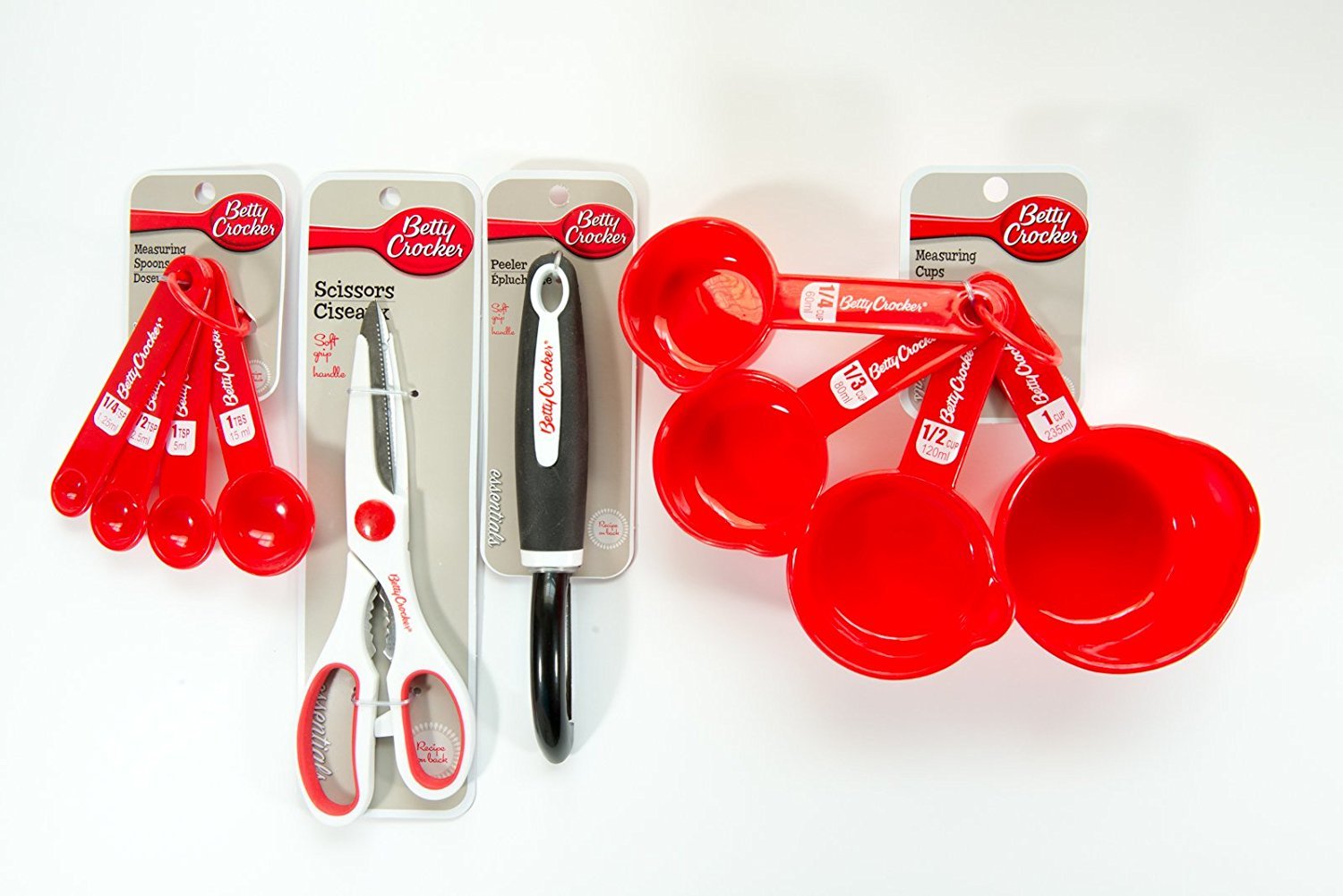 Betty Crocker Essentials 4 Piece Set - Includes Measuring Spoons, Scissors, Peeler and Measuring Cups