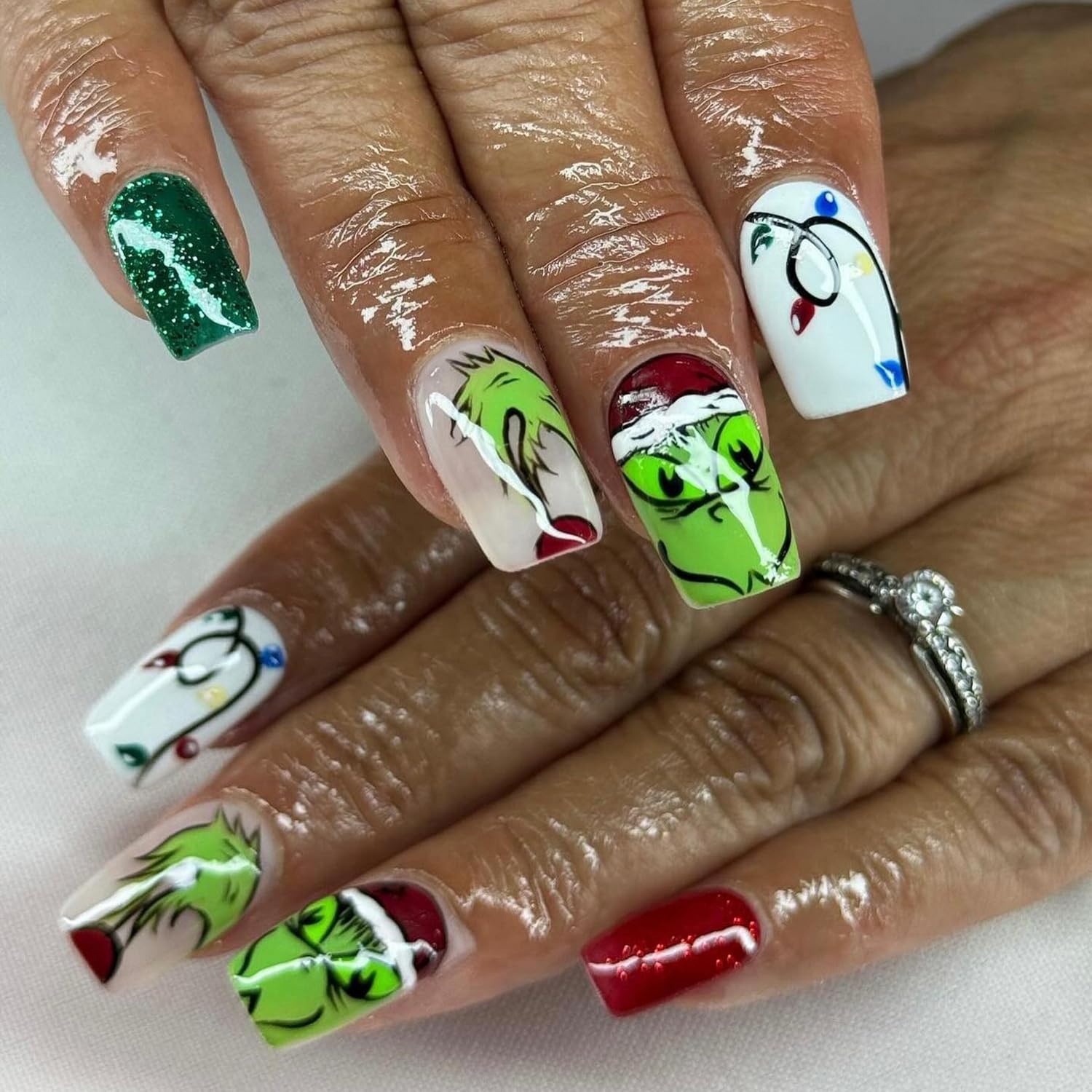 Photo 1 of 24 Pcs Christmas Press on Nails Medium Square False Nails Green Monster with Xmas Light Strip Design Green Red Winter Glitter Fake Nails Full Cover Acrylic Nails Stick on Nails for Women Nails Decor