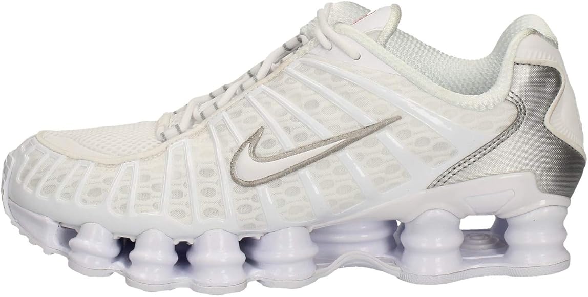 white and silver nike shoes