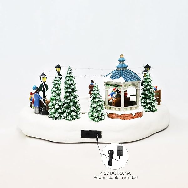 MOMENTS IN TIME ANIMATED SKATING POND 7.28”H LED CHRISTMAS VILLAGE DISPLAY WITH MOVING SKATERS, LIGHTS & MUSIC, ADAPTER OR BATTERY OPERATED, HANDCRAFTED POLYRESIN DECOR