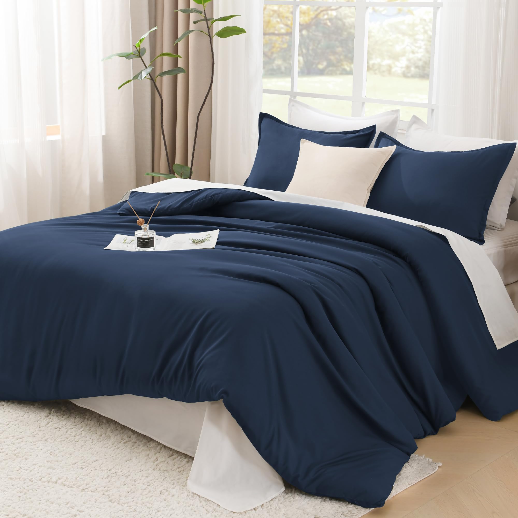 Photo 1 of Litanika Navy Blue Twin/Twin XL Comforter Set, 2 Pieces Lightweight Solid Bedding Set, All Season Fluffy Bed Set (66x90In Comforter & 1 Pillowcase)
