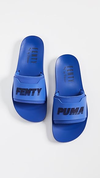 light blue puma slides