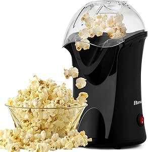 who invented the first popcorn machine