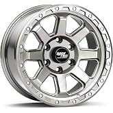 A close-up of a stylish matte black aftermarket truck wheel.