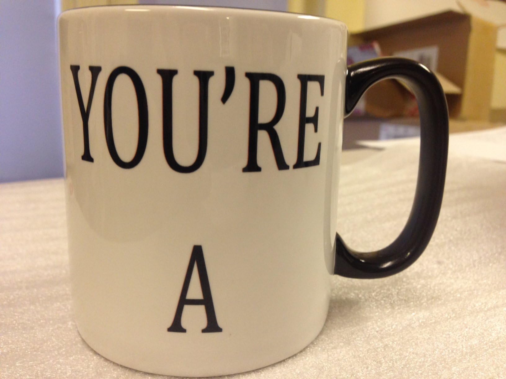 Rude mug Black Rim Handle Mug with Slogan YOU'RE A on the other side