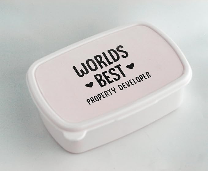 White lunch box with World's best Property Developer Amazon.co.uk