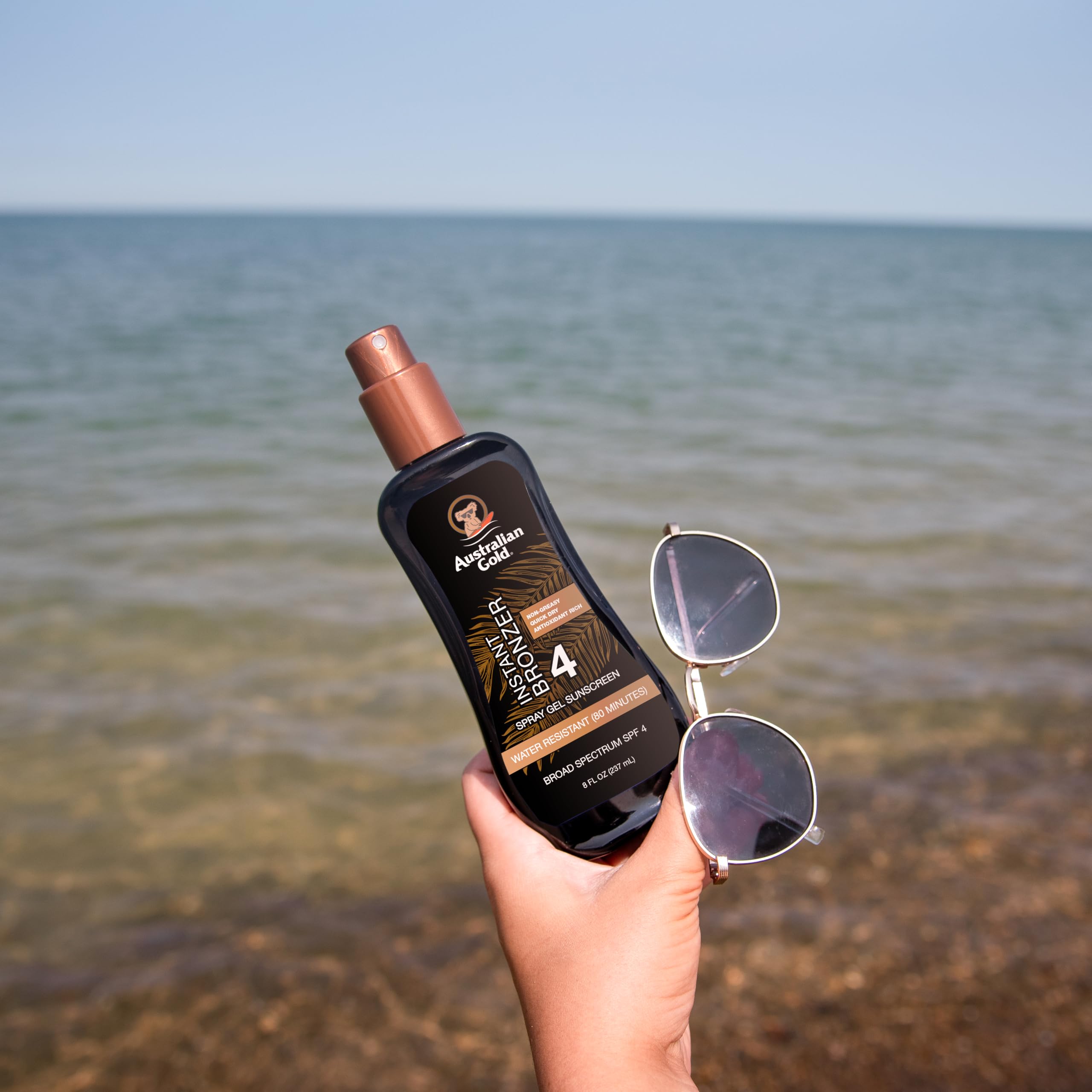 Australian Gold Spray Gel Sunscreen with Instant Bronzer SPF - 4, 8 Ounce | Moisturize & Hydrate Skin | Broad Spectrum | Water Resistant | Non-Greasy | Oxybenzone Free | Cruelty Free