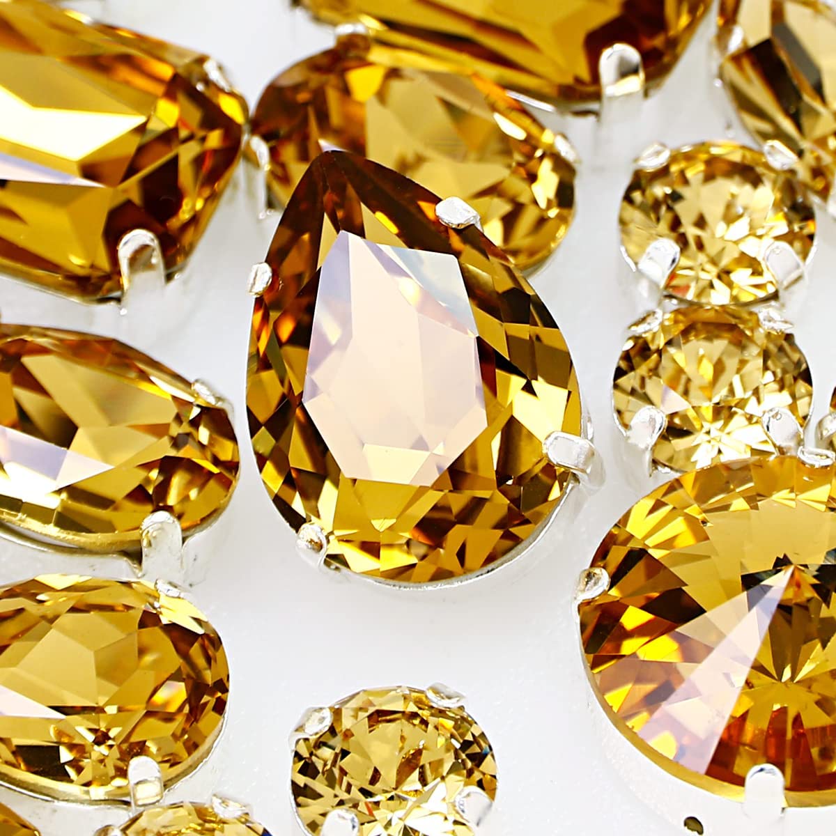 DONGZHOU Sew on Rhinestones with Silver Claw, Sewing Rhinestone Glass Sewing Gemstones for Jewelry Making DIY Crafts Clothing Shoes Wedding Decoration 82 Pieces, Light Colorado Topaz