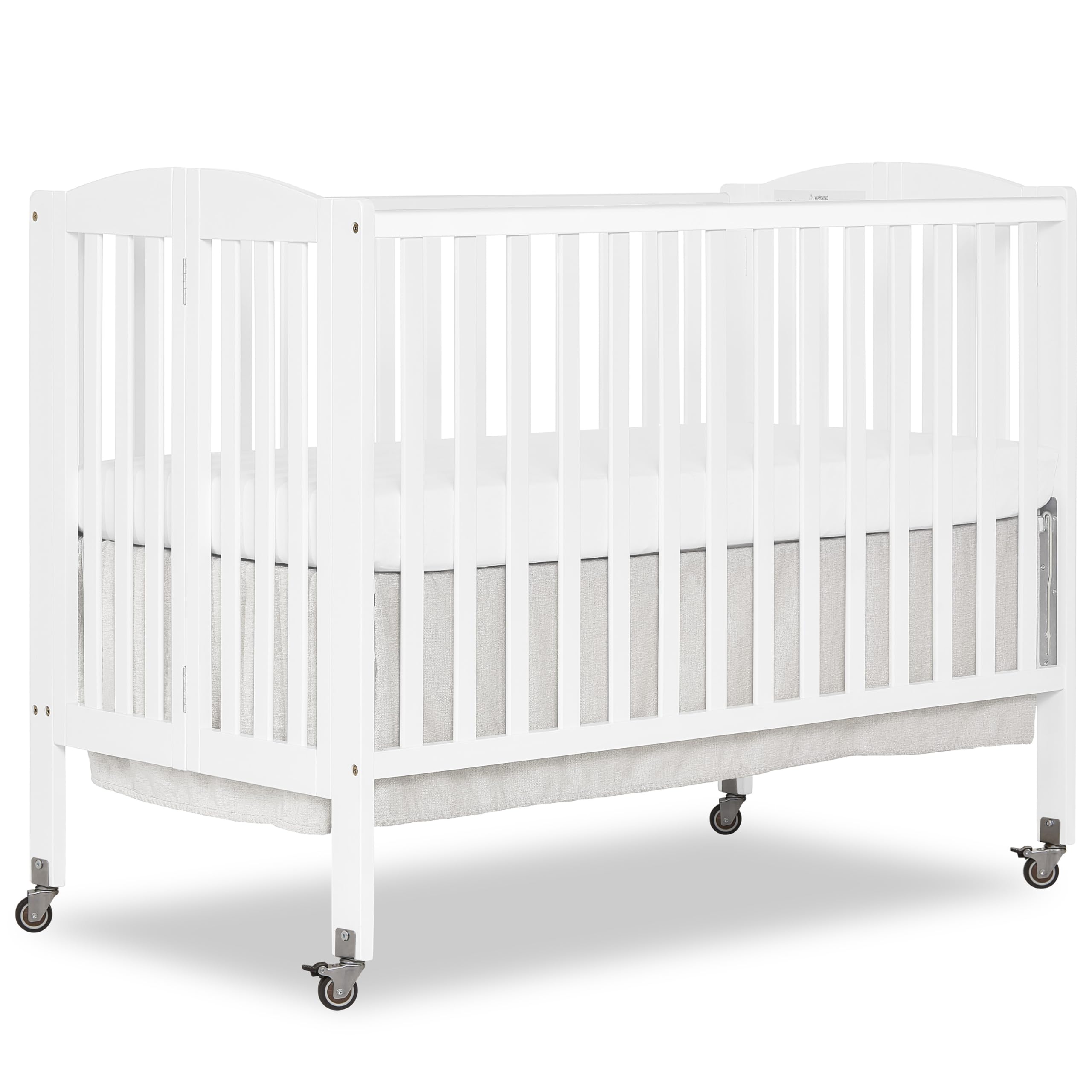 Photo 1 of Dream On Me Full-Size 2-in-1 Folding Baby Crib in White, GreenGuard Gold & BSA, Portable, Patented Quick Folding System, Strong Wheels, 2 Adjustable Mattress Heights