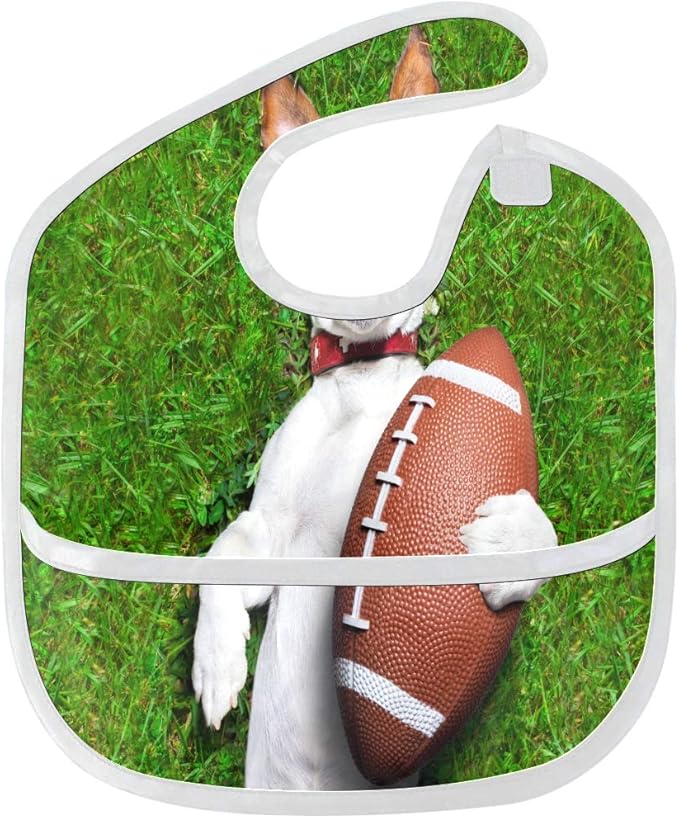 Baby-Lätzchen-Fußball-Hund, der Rugbyball-Lachen hält