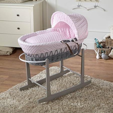 pink moses basket with rocking stand