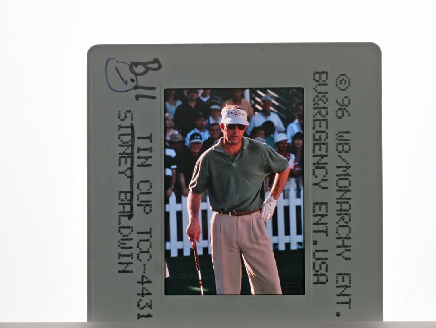 Slides photo of Kevin Costner as Roy"Tin Cup" McAvoy in Tin