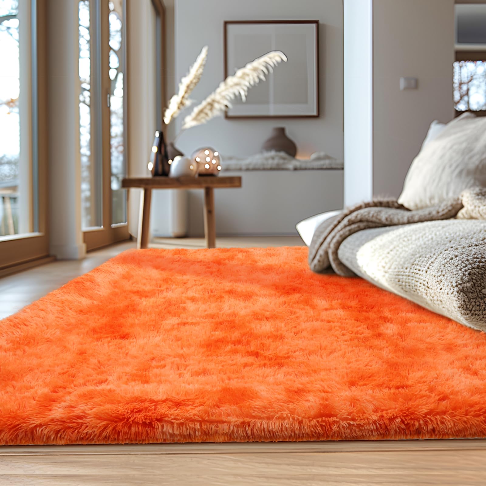 Photo 1 of VAIPI Orange Area Rug for Living Room 5x7 Feet Fall Soft Furry Rugs Cozy Plush Shag Area Rugs Fuzzy Faux Fur Rectangle Carpet Burnt Orange Rugs for Bedroom Aesthetic Room Decor and Accessories