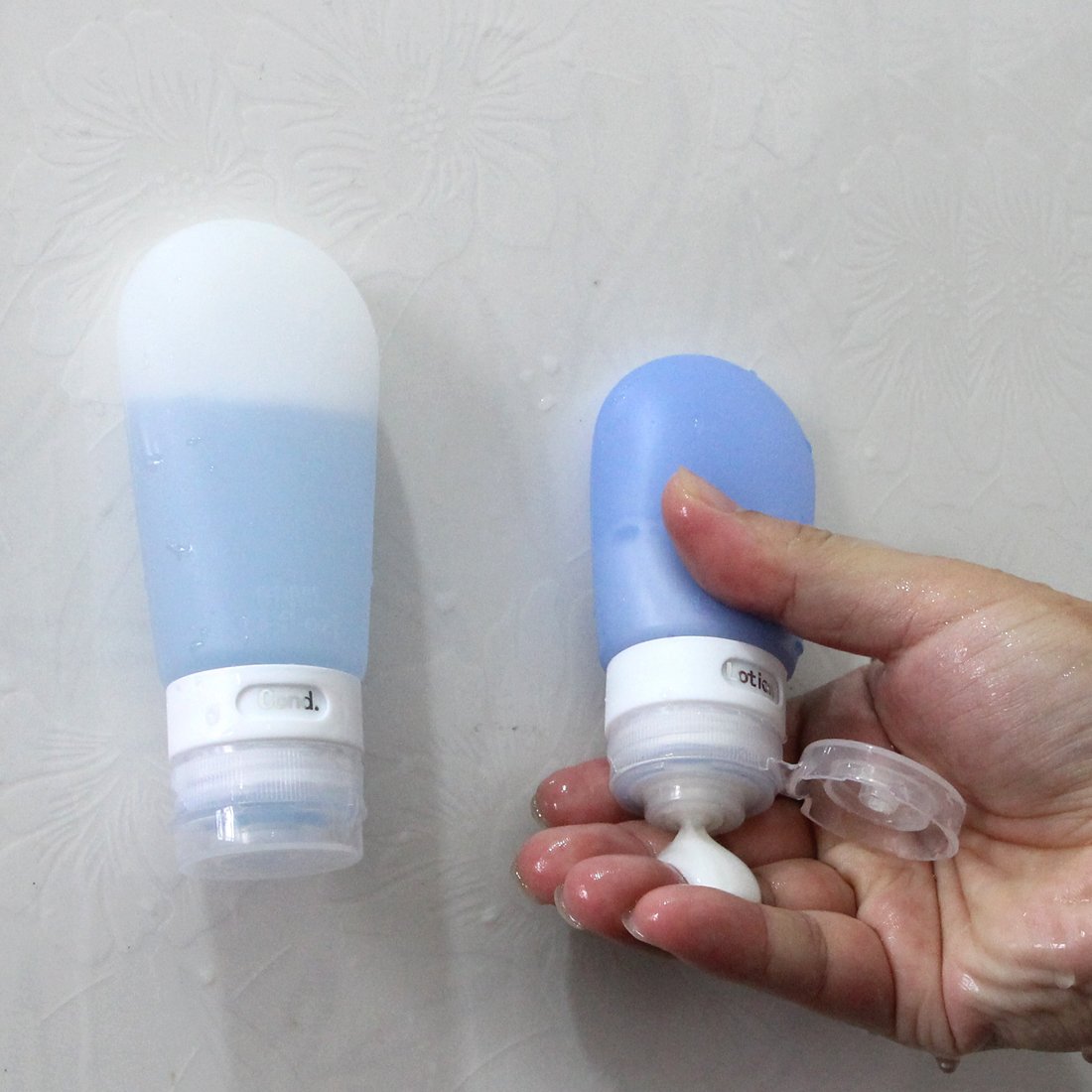 Silicone Travel Bottles 4 Pack Leakproof Refillable Travel Size Bottles TSA Approved BPA Free Squeeze Travel Tubes Set with Bag Empty Travel Containers for Toiletries (3oz and 2oz)