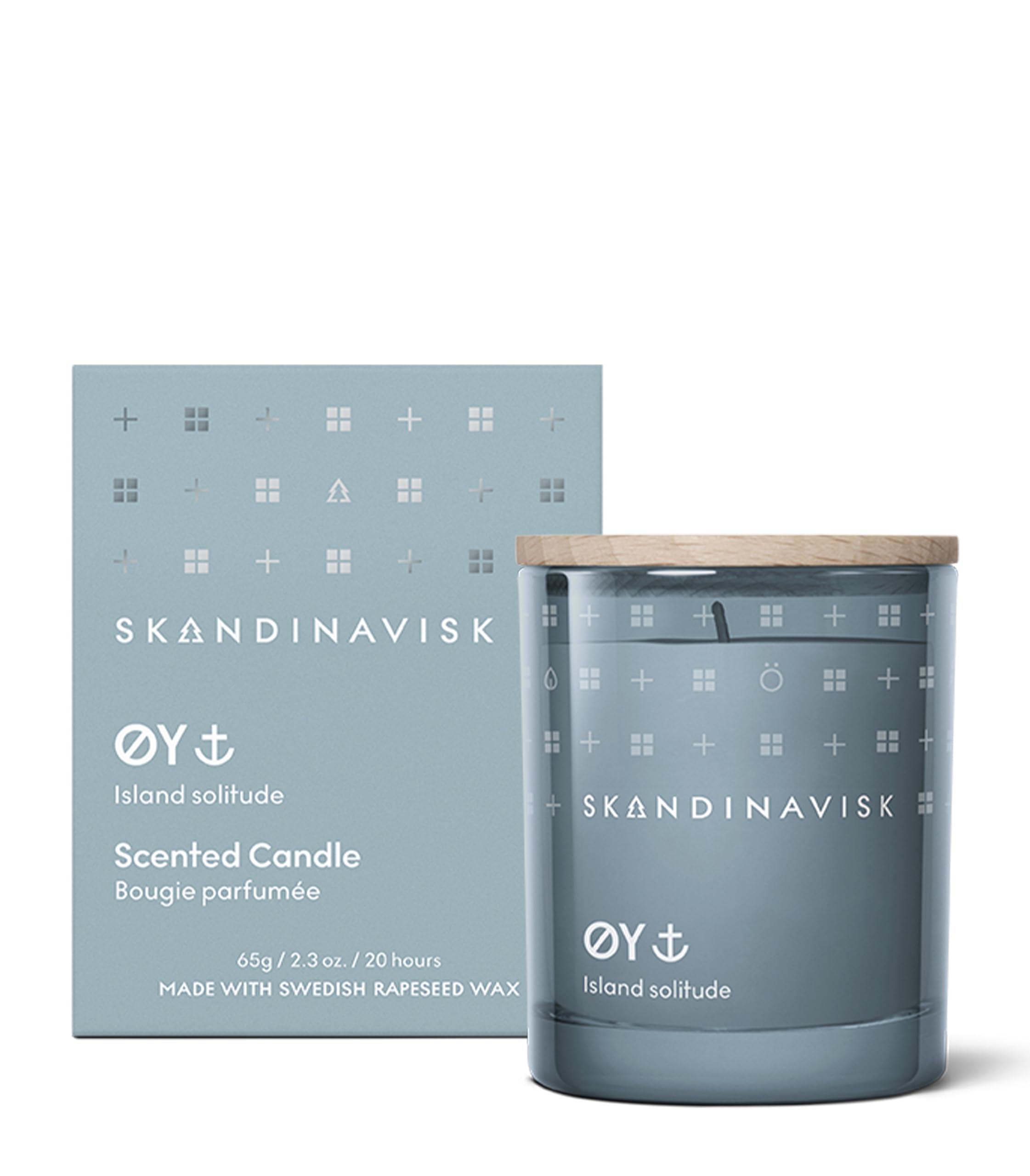 Skandinavisk ØY 'Island' Mini Scented Candle. Fragrance Notes: Crabapple and Dog Rose, Water Mosses and Green Leaves. 65 g.