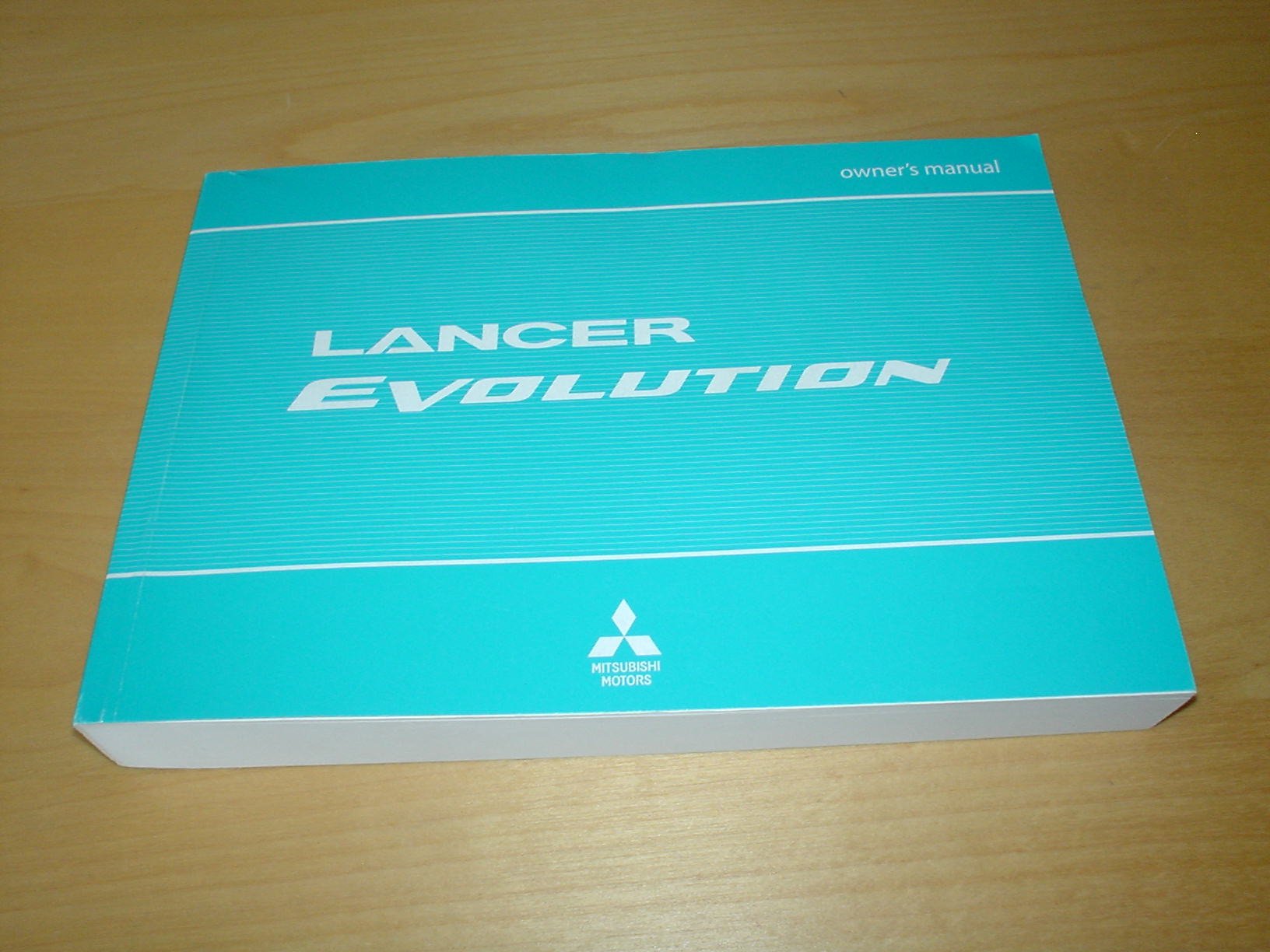 MITSUBISHI LANCER EVOLUTION X OWNERS MANUAL HANDBOOK - 2.0 LITRE 4B11  ENGINE -RS GSR MR - M/T TWIN CLUTCH SST - OWNER'S HAND BOOK MANUAL  Paperback – 2008
