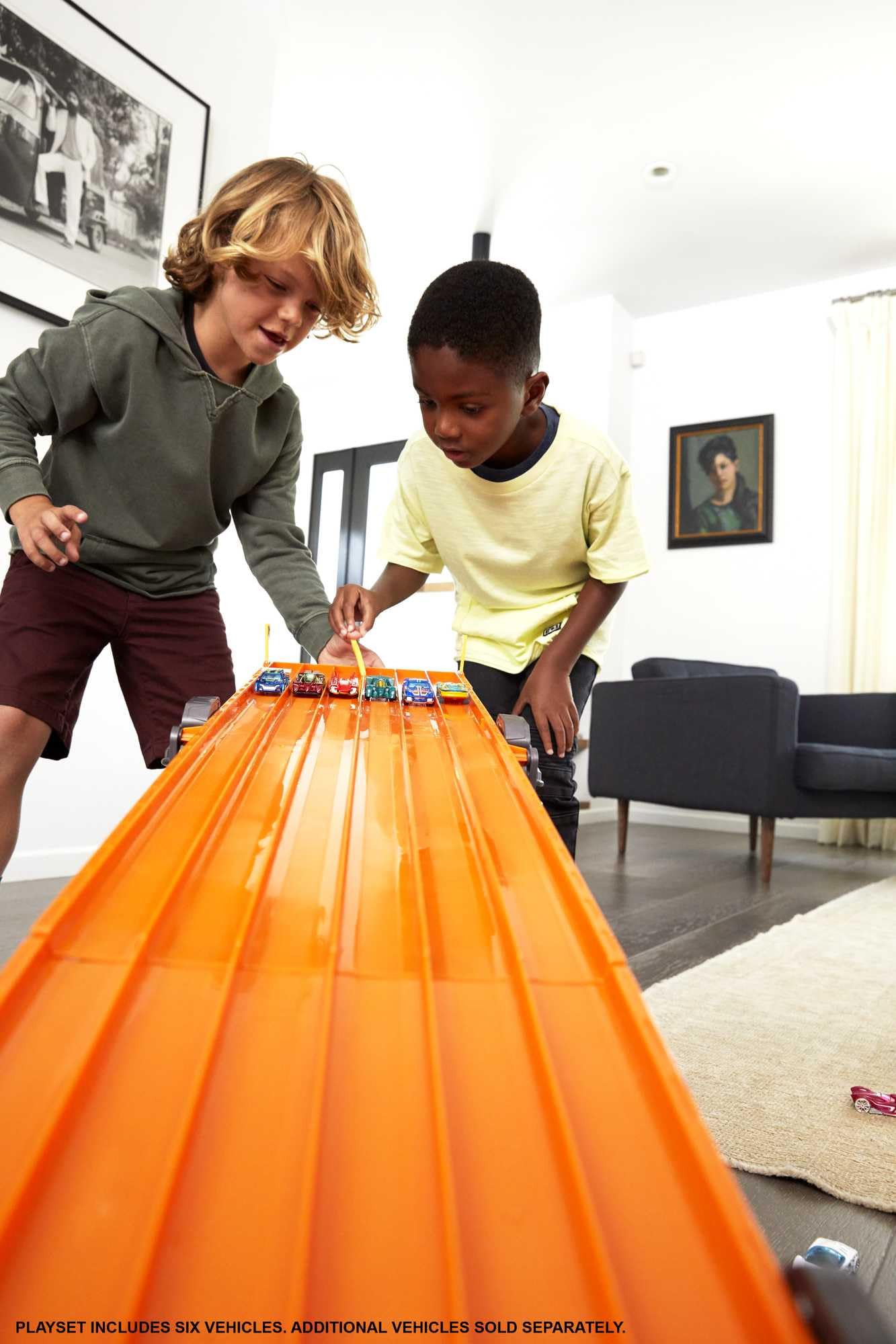 Hot Wheels Toy Car Track Set with Lights, Sounds & 6 1:64 Scale Vehicles, Super 6-Lane Raceway, 8-foot Track that Rolls Up for Storage (Amazon Exclusive)