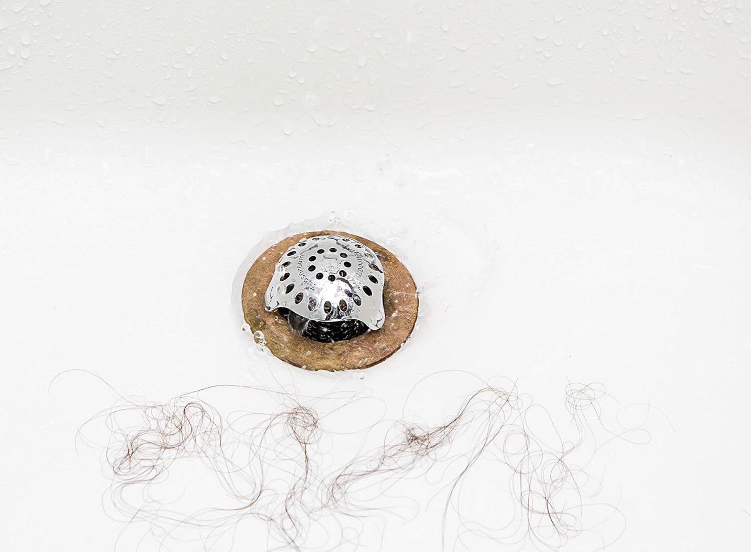 TubShroom Ultra Revolutionary Bath Tub Drain Protector Hair Catcher/Strainer/Snare, Stainless Steel: Home & Kitchen
